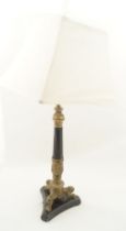 EMPIRE STYLE BRASS AND EBONIZED TABLE LAMP