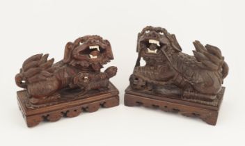 PAIR OF CARVED 19TH-CENTURY CHINESE FO DOGS