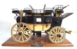 19TH-CENTURY TIN MODEL OF A COACH