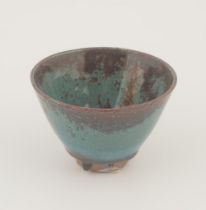 MID-CENTURY GREEN AND MAUVE ENAMELLED BOWL