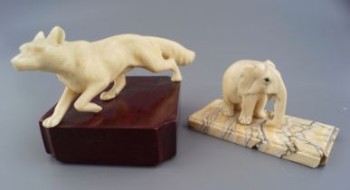 TWO ANIMALIA PAPER WEIGHTS