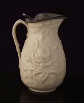 ART NOUVEAU FAIENCE AND PEWTER EWER