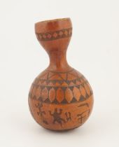 CARVED AFRICAN BOTTLE