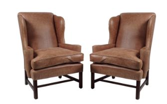 PAIR HIDE UPHOLSTERED WINGBACK ARMCHAIRS