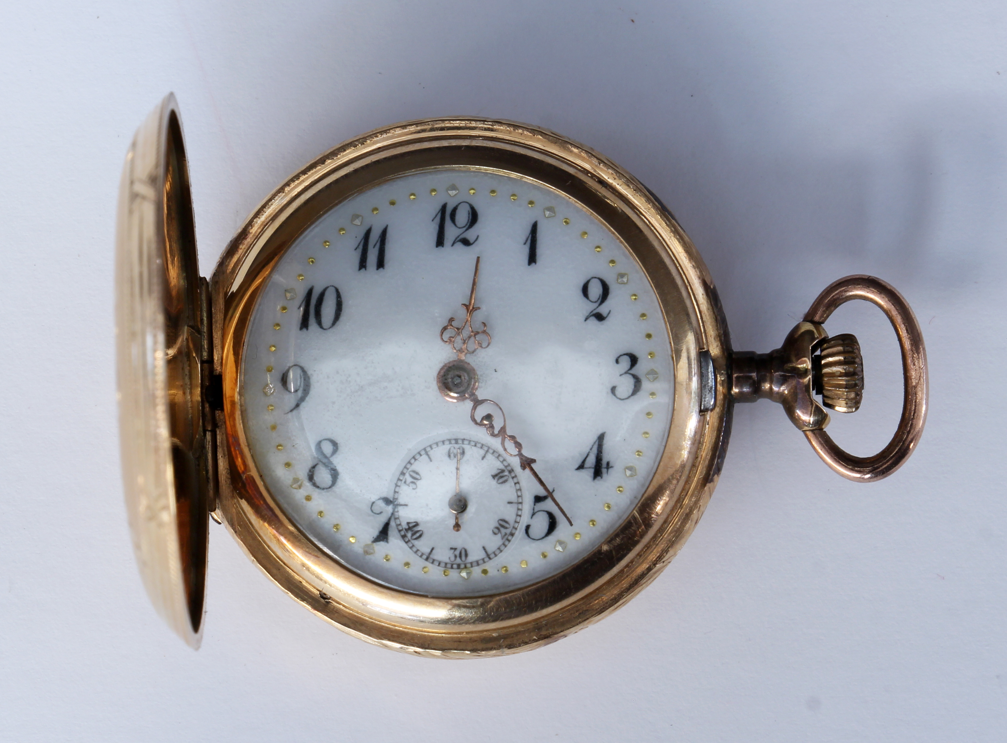 A GOLD LADIES POCKET WATCH