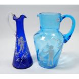 A Mary Gregory style turquoise glass jug painted boy with boat, 18cm and a blue jug painted cherub