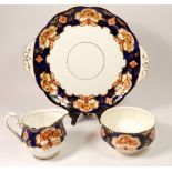 A Royal Albert 'Heirloom' tea service comprising: six cups and saucers, jug and sugar, six tea