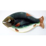 A large pottery fish form platter 44cm long