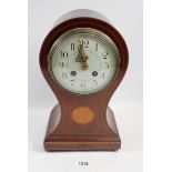 An Edwardian mahogany and satinwood inlaid mantel clock of balloon form with striking movement, 30cm