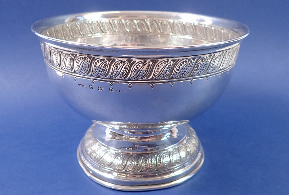 A silver presentation bowl with inscription, 495g on wooden stand