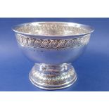 A silver presentation bowl with inscription, 495g on wooden stand