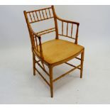 A 19th century beech turned bamboo style open armchair with spindle back (replacement seat panel)