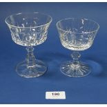 Two sets of six cut glass champagne glasses