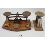 An Edwardian mahogany and brass set of postal scales and another set a/f
