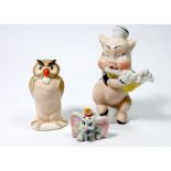 A Walt Disney pig toothbrush holder, a Beswick owl and a Wade Dumbo