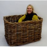 A very large vintage wicker log basket, 90 x 60 x 80cm