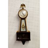 A Seth Thomas American wall clock with eagle surmount, 72cm tall