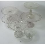 A group of five glass cake stands etc.