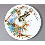 A Royal Worcester Victorian Aesthetic style plate printed and painted monkey picking fruit, 23.5cm