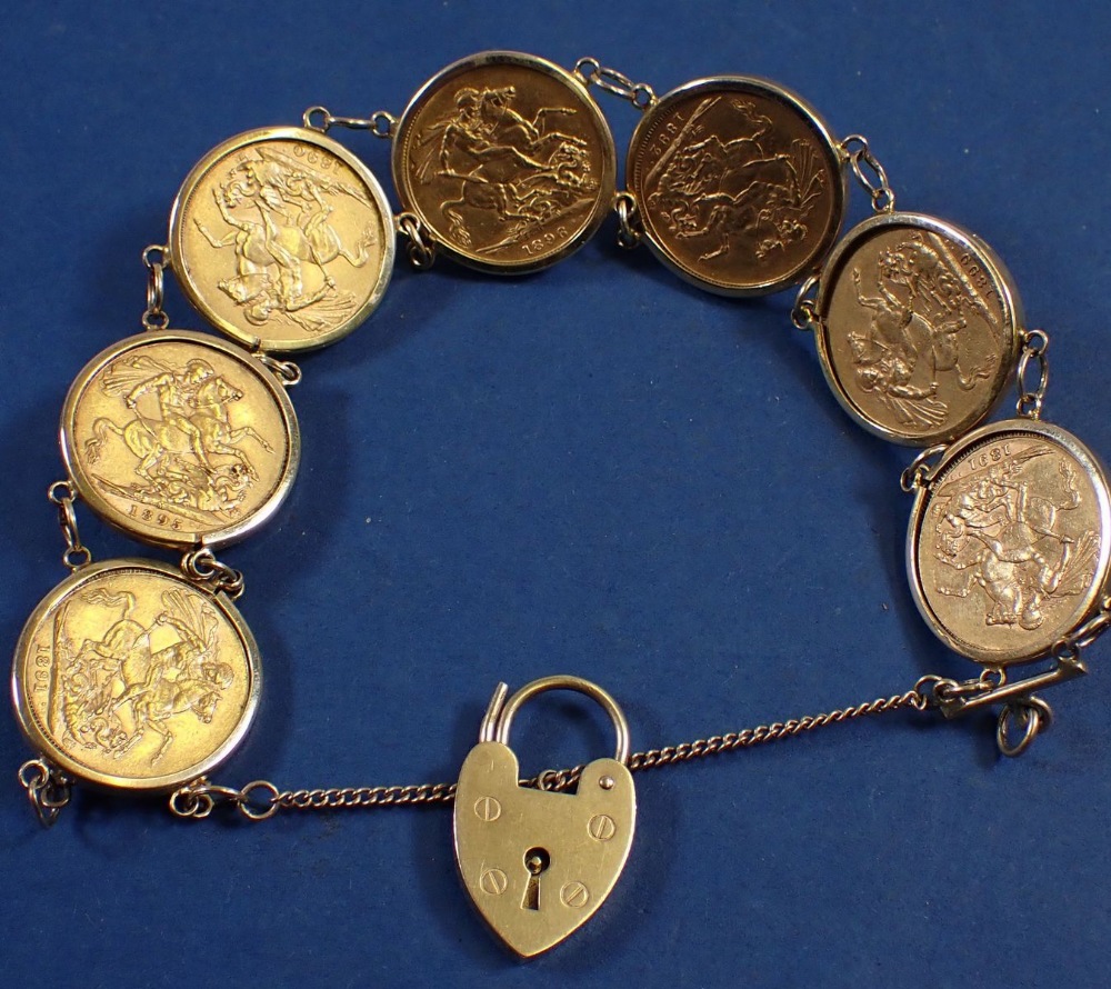 A bracelet with encased gold sovereigns dates: 1891 2 off, 1890, 1892, 1895, 1896 and 1899 Victorian