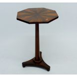 An early 19th century rosewood and mahogany octagonal occasional table with segmented parquetry