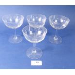 A set of six cut glass champagne glasses and nine others