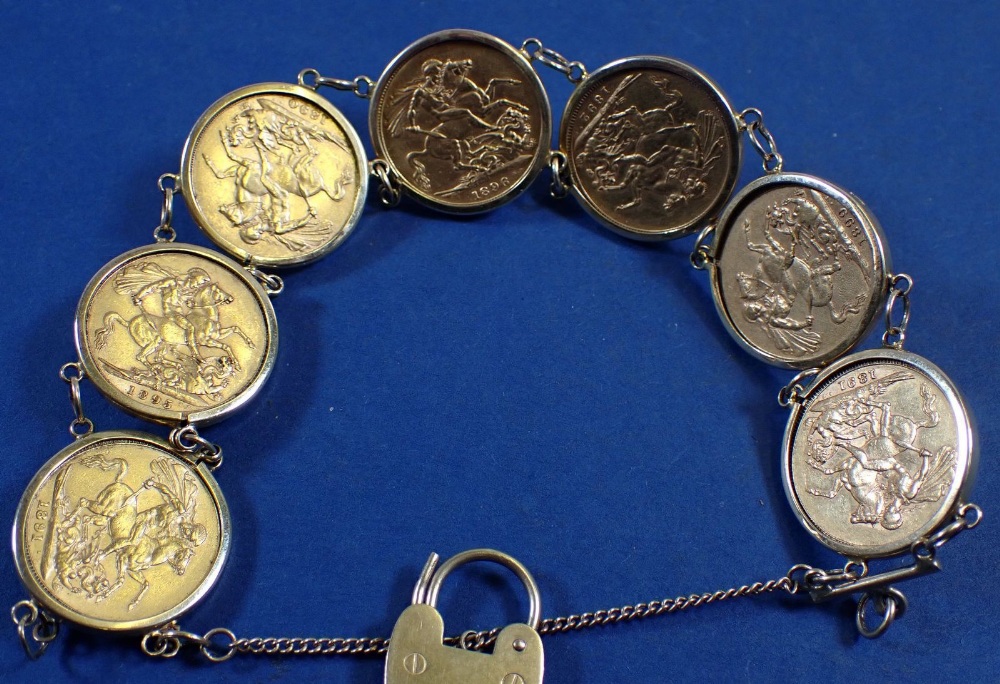 A bracelet with encased gold sovereigns dates: 1891 2 off, 1890, 1892, 1895, 1896 and 1899 Victorian - Image 2 of 3