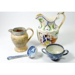 A Victorian jug painted fighting couples a/f, a blue and white jug, a ladle and a Leadless Glaze Co.