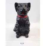 A vintage painted plaster black Scottie dog 21cm tall