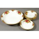 A Royal Albert 'Country Roses' dessert bowl and six smaller bowls