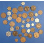 A quantity of British coinage pre-decimal mainly copper/bronze including: Farthings, halfpennies,