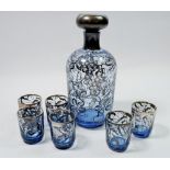 A 1920's blue glass liqueur decanter and six glasses with silvered vine decoration