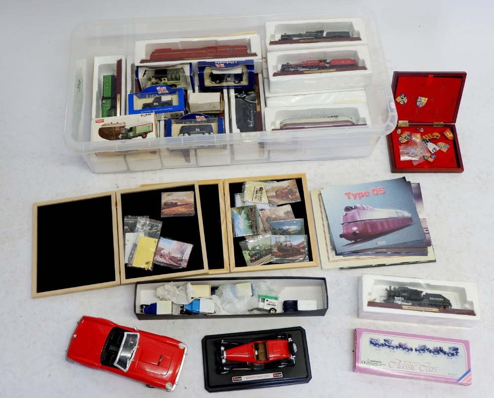 A box of model cars and trains including fifteen boxed Atlas model locomotives, Corgi Thornycroft