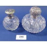 A cut glass spherical scent bottle with screw lid, Birmingham 1888, 9cm and another smaller one with