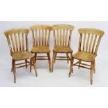 A set of four lightwood farmhouse chairs