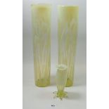 A pair of tall Victorian cylindrical Vaseline glass vases, 38cm and a smaller Vaseline glas vase