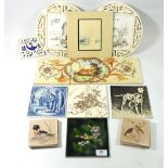 A collection of various tiles including a set of six Thynne England tiles with hand painted bird and