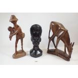 Three various wooden carvings including a Kruga Park antelope, an African carved head and an