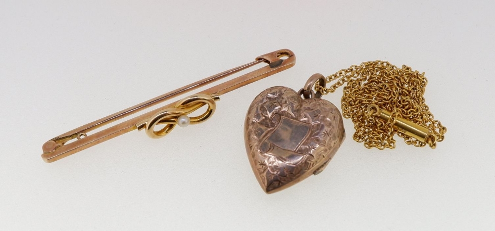 A gold bar brooch set seed pearl unmarked, 3g and a gold heart form locket on chain 4.2g , a/f