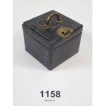 A leather clad travelling inkwell