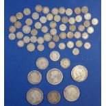 A quantity of silver content coinage mainly British, George III through George VI including: crowns,