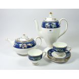 A Wedgwood Blue Siam tea set comprising: teapot, fourteen tea cups, four saucers, five tea plates,