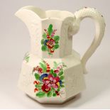 A large Victorian octagonal jug painted flowers, 20cm tall