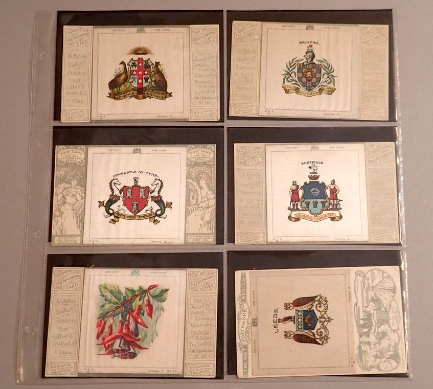 A collection of five Heraldic silk postcards by W N Sharpe including GB cities, Australia plus one