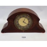 An Edwardian mahogany mantel clock retailed by Picketts of Portsmouth with decorative inlay and