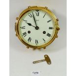 A German Schatz brass ships wheel form 8 day clock with key, 15cm diameter