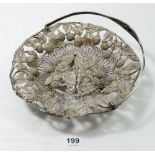 An Indian white metal pierced and embossed basket decorated raspberries, 18cm diameter