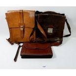 Two leather vintage bags and leather clutch bag