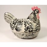 A Price's pottery chicken on a basket
