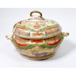 An early 19th century English porcelain oval sauce tureen decorated oriental motifs